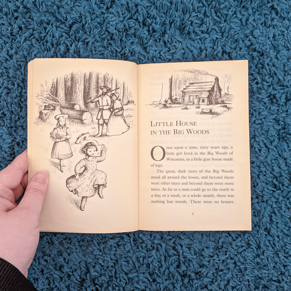 Bookstagram photo features the illustrated first page of LITTLE HOUSE IN THE BIG WOODS.